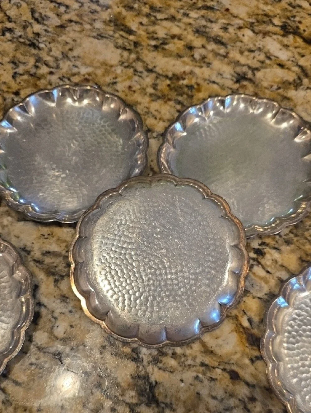 Set Of 7 Silver Hammered Metal Coasters